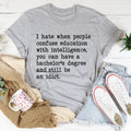 Don't Confuse Education With Intelligence Tee