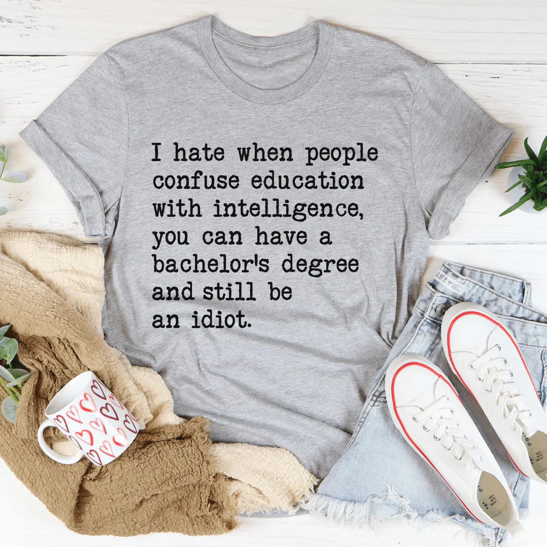 Don't Confuse Education With Intelligence Tee