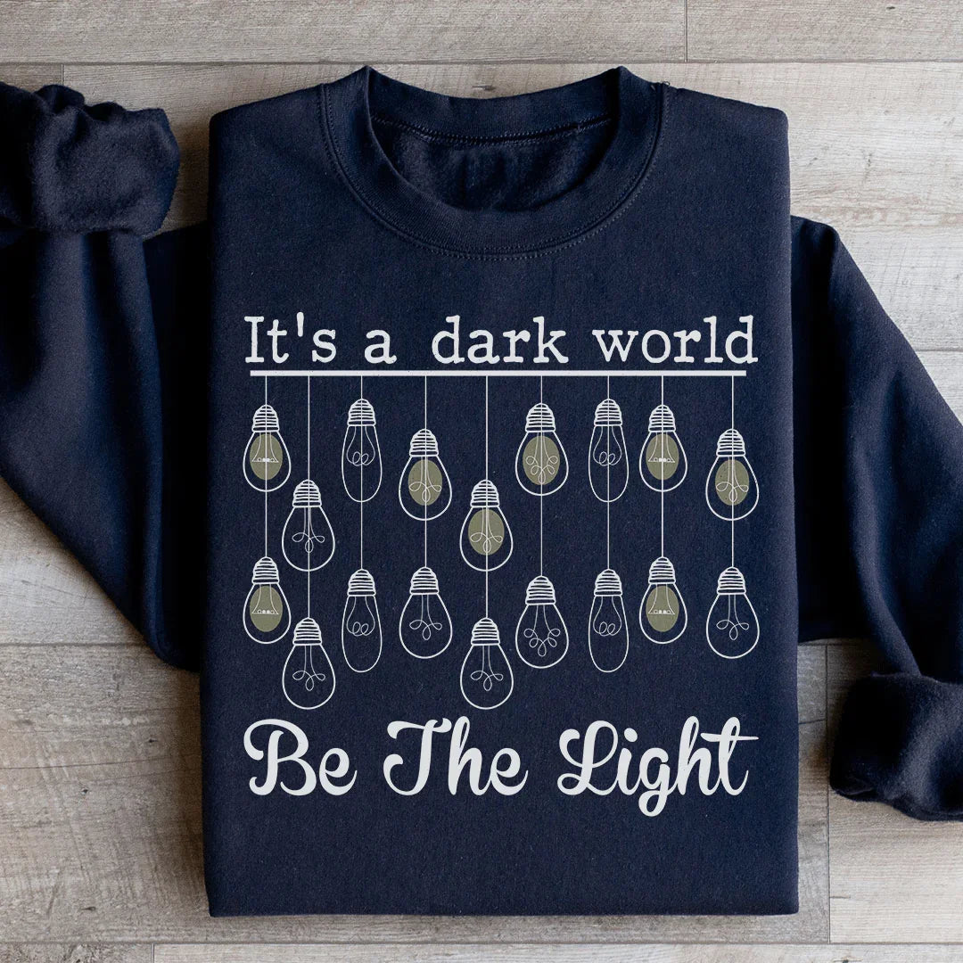 It's A Dark World Be The Light Sweatshirt