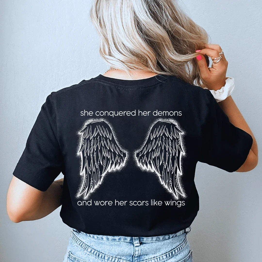 She Conquered Her Demons And Wore Her Scars Like Wings Tee